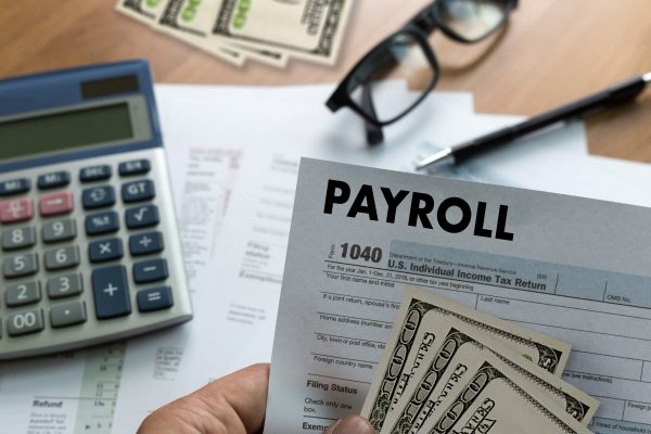 PAYROLL Businessman working Financial accounting concept PAYROLL Businessman working Financial accounting concept